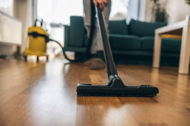 istock Unrecognizable Person Vacuuming Floor 2221878716