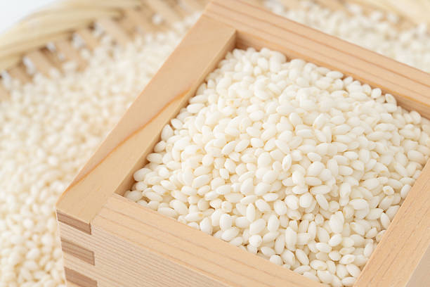 istock Glutinous rice in a wooden measuring box (masu) 2221879621