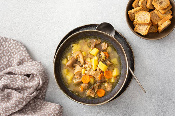 istock Oyster mushroom soup in plates 2221880358