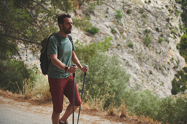 istock Male Hiker Exploring Rocky Terrain With Scenic Background 2221883790