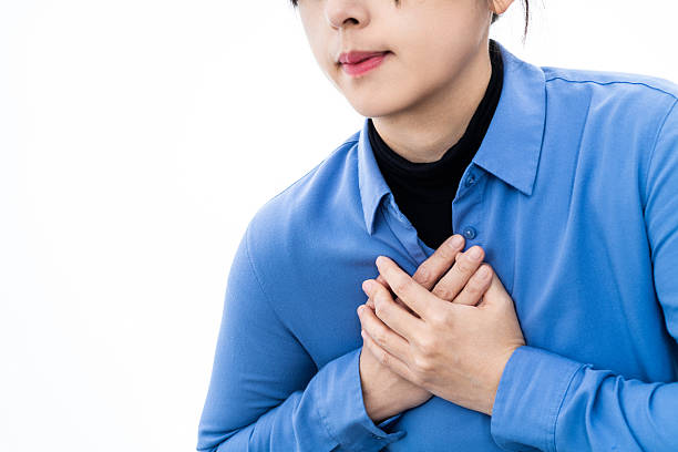 istock Young woman having heart attack 2221884127