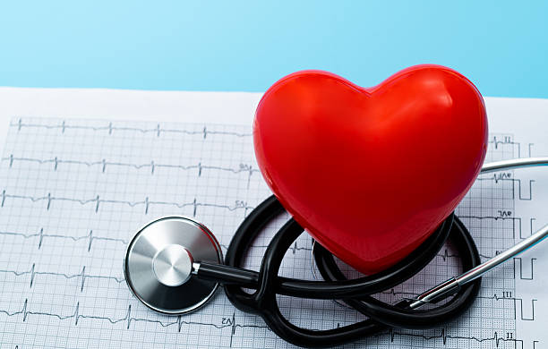 istock Red heart and stethoscope on the electrocardiogram 2221884133