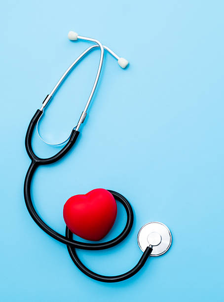 istock Red heart and stethoscope on blue background 2221884141