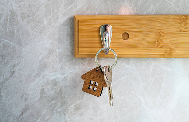 istock House keys with key ring hanging on the hook 2221884144