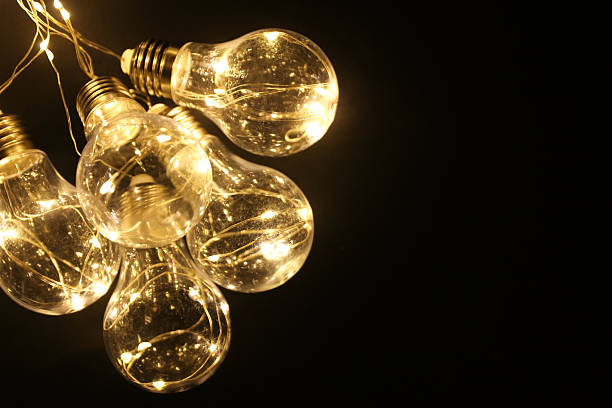 istock LED garland retro light bulbs on black background 2221884807