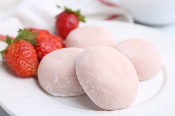 istock Delicious mochi and strawberries on plate, closeup 2221891633