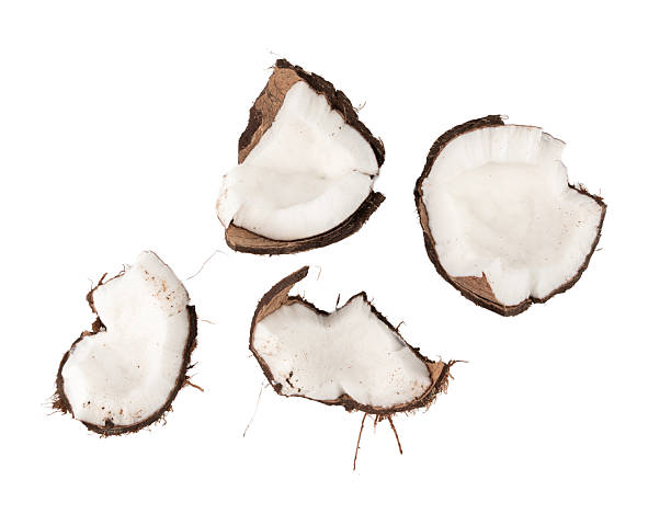 istock Coconut pieces, broken coco nut isolated, fresh tropical palm fruit slices, open cracked coconut 2221893742