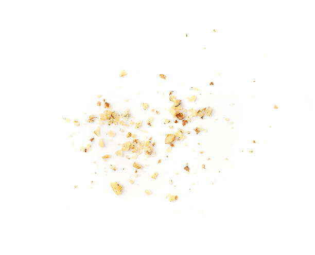 istock Grated wallnut , broken roasted walnuts, heap of nuts crumbs, whole kernel pieces, fractions 2221893760