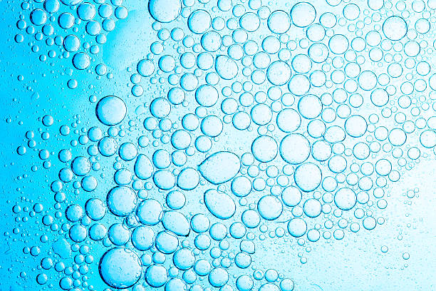 istock Close-up of blue macro bubbles,abstract dark blue science background,Blue bubble abstract, oil and water. 2221894044