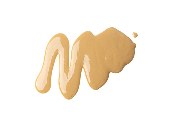 istock Tahini smear isolated, sesame seeds paste splash, spilled tahina sauce, spill eastern dip 2221894191
