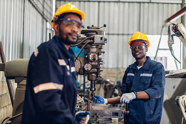 istock Workers Factory or Engineering work at factory site check up machine or products in site. Foreman or Technician checking Material or Machine on Plant. Heavy industry factory concept. 2221894448