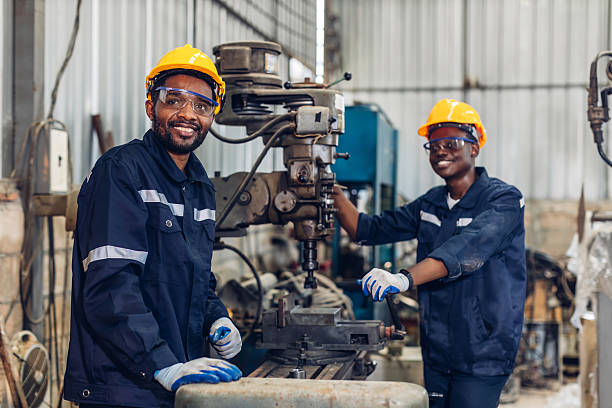 istock Workers Factory or Engineering work at factory site check up machine or products in site. Foreman or Technician checking Material or Machine on Plant. Heavy industry factory concept. 2221894453