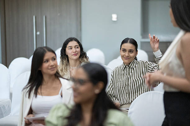 istock public listening to a conference 2221894558