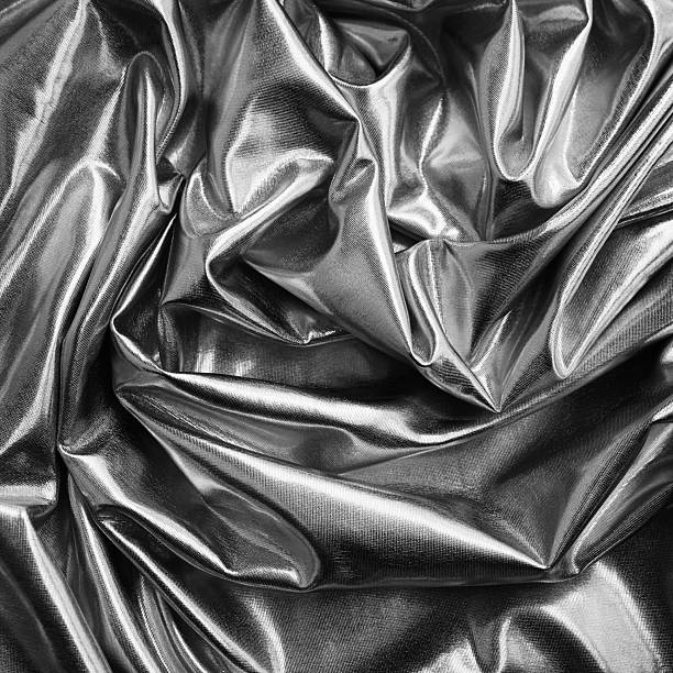 istock Black white light gray silver silver background. Crumpled shiny material fabric. Glitter shine metallic glossy foil shummer reflection. Curved fold wavy lines liquid. Design. 2221898129