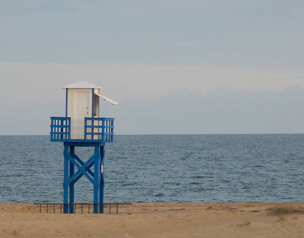istock The blue lifeguard chair on a beach 2221898586