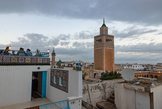A picture of the minaret of the Al-Zaytuna Mosque as seen a nearby cafe.