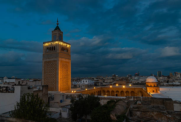 A picture of the Al-Zaytuna Mosque at sunset.