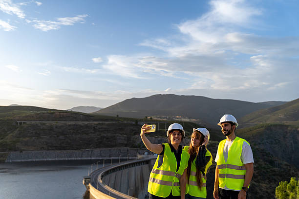 istock Engineers taking a selfie at a dam reservoir 2221908534