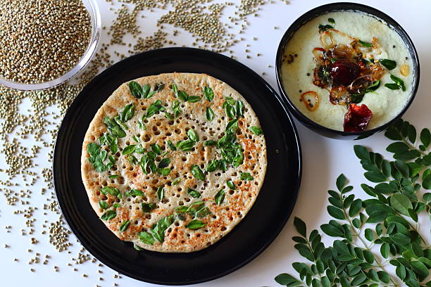istock Bajra dosa, also known as millet pancake, made with nutritious muringa or drumstick leaves 2221908945