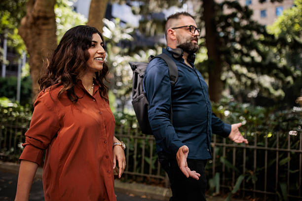 istock Colleagues Walking to Work Through Park in Sydney 2221909794