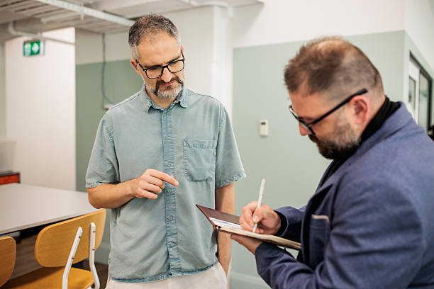 istock Business Professionals Networking in Modern Office 2221910064