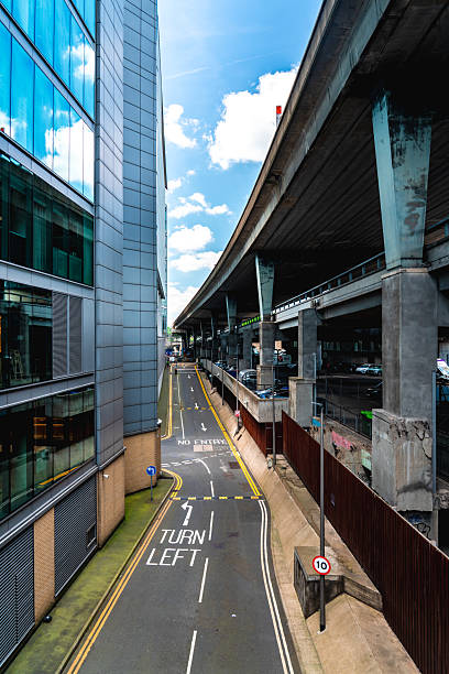 istock Empty road passing under a flyover in london city center 2221912626