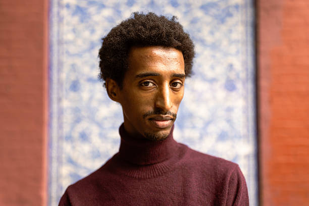 istock Portrait of a Man in Maroon Sweater 2221917376