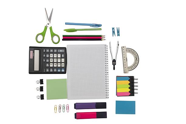 istock School and office supplies, pens, pencils, ruler, compass, calculator on a white background. 2221918256