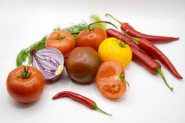 Fresh Vegetables on the Table in the Kitchen, Highlighting the Concept of Home-Grown Produce. The Scene Showcases a Variety of Vegetables Harvested from a Home Garden, Emphasizing the Natural and Healthy Qualities of Home-Grown Food. The Bright and Inviting Kitchen Setting Enhances the Focus on Nutritious, Locally-Sourced Ingredients.