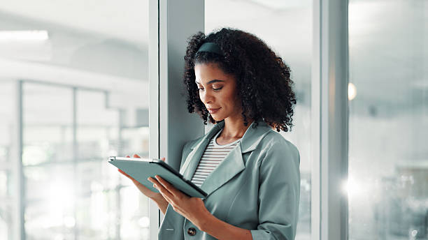 istock Business, african woman and tablet with internet connection for networking, communication or email. Employee, person and technology for space, search and planning online with digital data access 2221919159