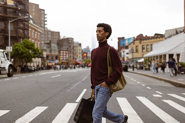 istock Urban Street Style: Man Crossing City Street 2221924632