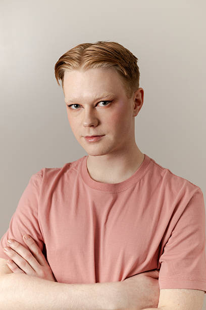 istock A Vertical Close-up Portrait of Man with Makeup and Confident Expression 2221926627