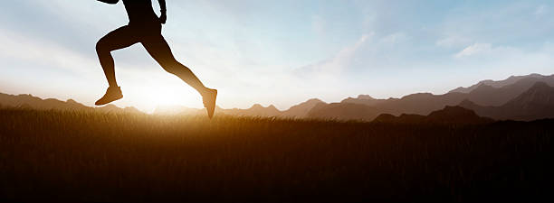 istock panoramic - man ridge running on the mountain 2221927585