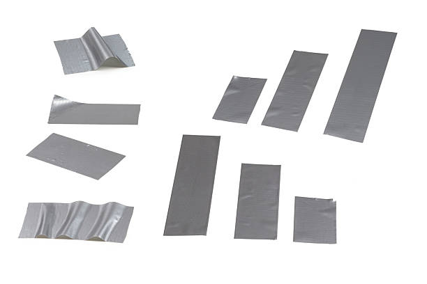 istock Silver scotch tape pieces isolated on white background. 2221928999