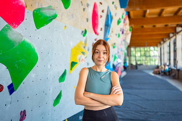 istock Empowered Female Climber Posing with Confidence 2221929316