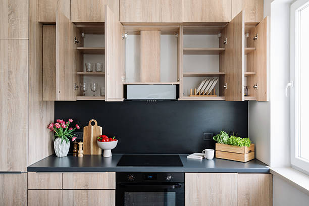istock Modern kitchen interior featuring stylish cabinets and a sleek countertop 2221945653