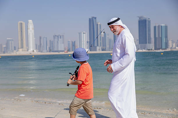 istock Two generations fishing together 2221946972