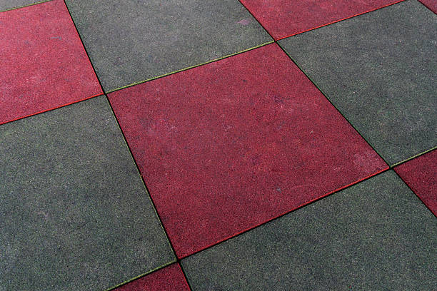istock Rubber Tile Flooring with Alternating Colors on Play Area Surface 2221952363