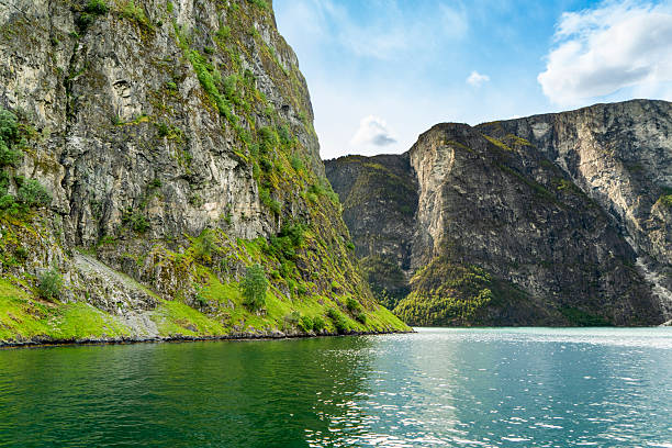 istock Imposing cliffs and calm waters Naeroyfjord vista 2221954945