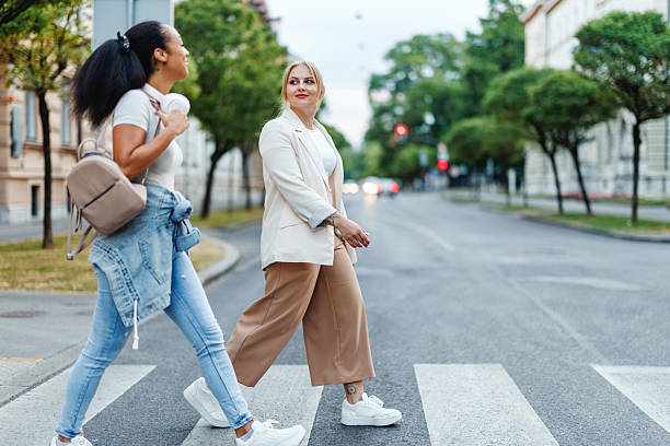 istock Two Friends Enjoy a Lighthearted Commute in the City 2221961727