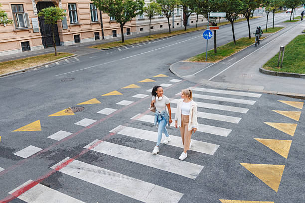 istock Two Friends Enjoy Walking in the City 2221961734