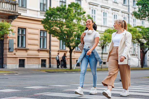 istock Two Happy Friends Enjoying City Walk to Work 2221961746