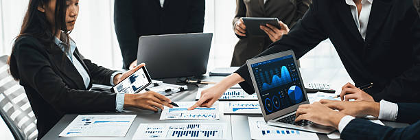 istock Analyst team utilizing BI Fintech to analyze financial report. Prodigy 2221966460
