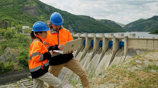 istock Engineers Work In Hydroelectric Power Plant. AI In Renewable Energy Systems 2221966860