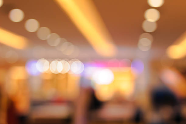 istock Soft warm golden light bokeh circles creating a beautiful abstract background texture effect 2221978645