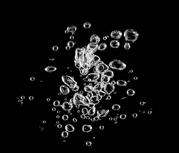 istock white water bubble liquid abstract isolated black background. designing oxygen air underwater, bubble in water 2221987695