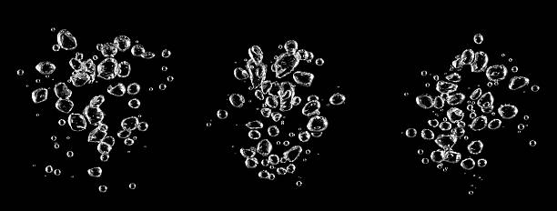 istock white water bubble liquid abstract isolated black background. designing oxygen air underwater, bubble in water 2221987707