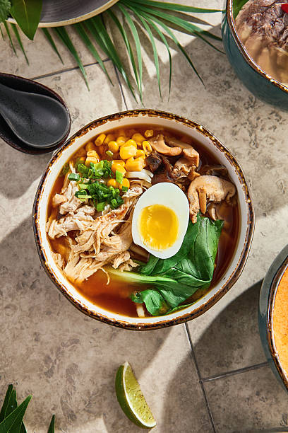 istock Chicken ramen with pak choi under bright natural light, overhead flatlay composition 2221987845