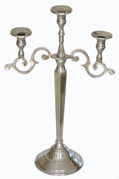 istock Elegant Silver Candelabra Isolated. Classic three-arm candlestick, for decorative lighting or festive occasions. Vintage and refined design. 2221991327