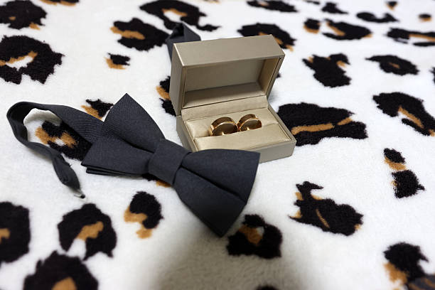 Box with wedding rings and bow tie. Preparation for the wedding.